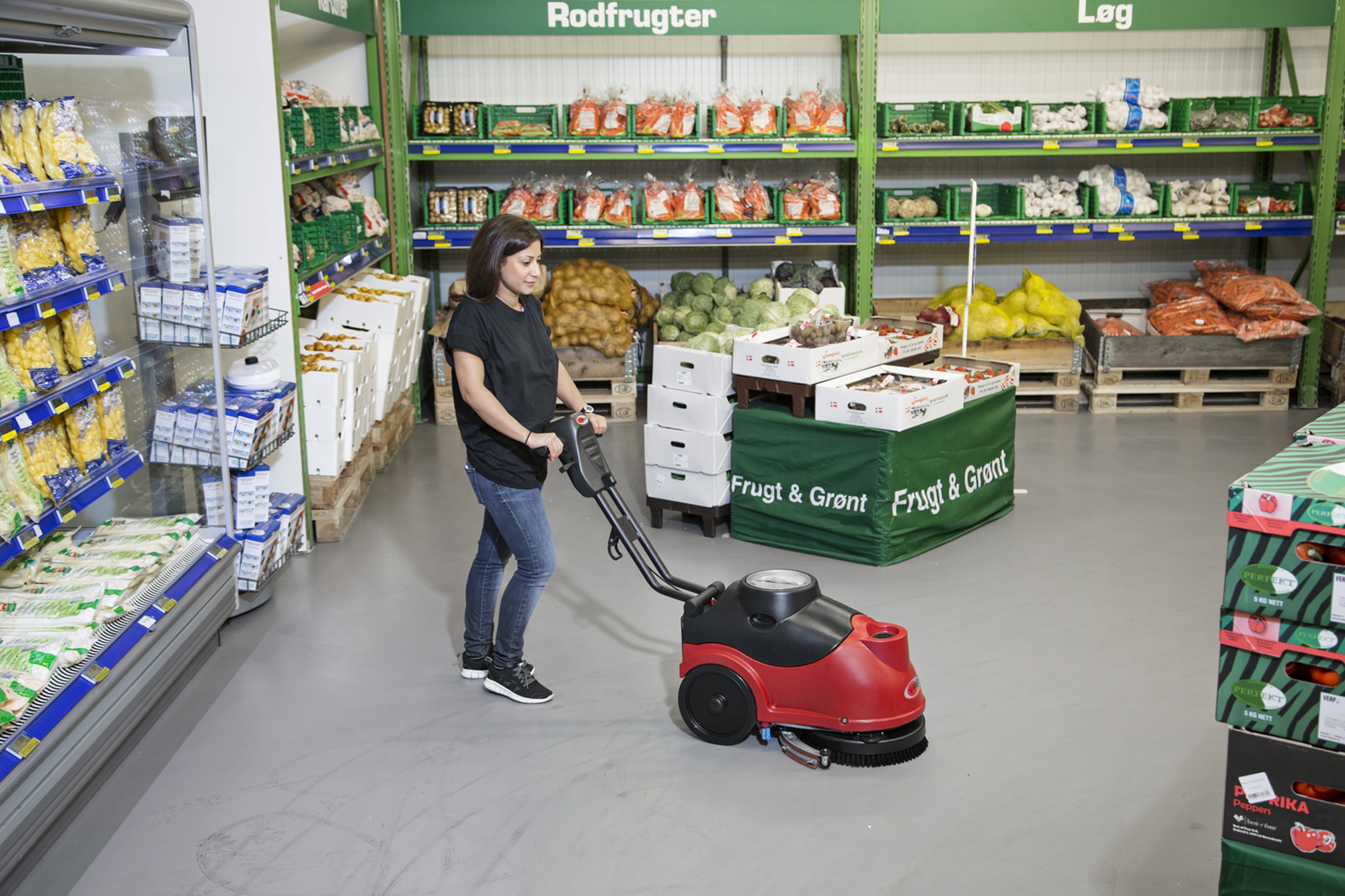Fang 15B walk behind micro floor scrubber cleaning in a grocery store